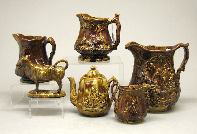 Bonhams : Six Rockingham or flint enamel glazed pottery pitchers 19th ...