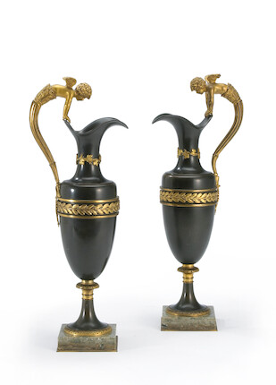 Bonhams : A pair of Empire style patinated and gilt bronze ewers late ...