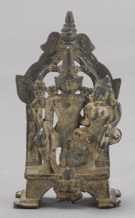 Bonhams : A Bengali copper alloy shrine depicting Vishnu and consort