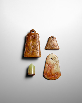 Bonhams : FOUR ARCHAISTIC JADE AND HARDSTONE BELL-SHAPED PENDANTS Late ...