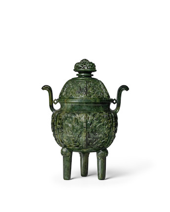 Bonhams : A GLOBULAR SPINACH GREEN JADE TWO-HANDLED TRIPOD CENSER AND ...