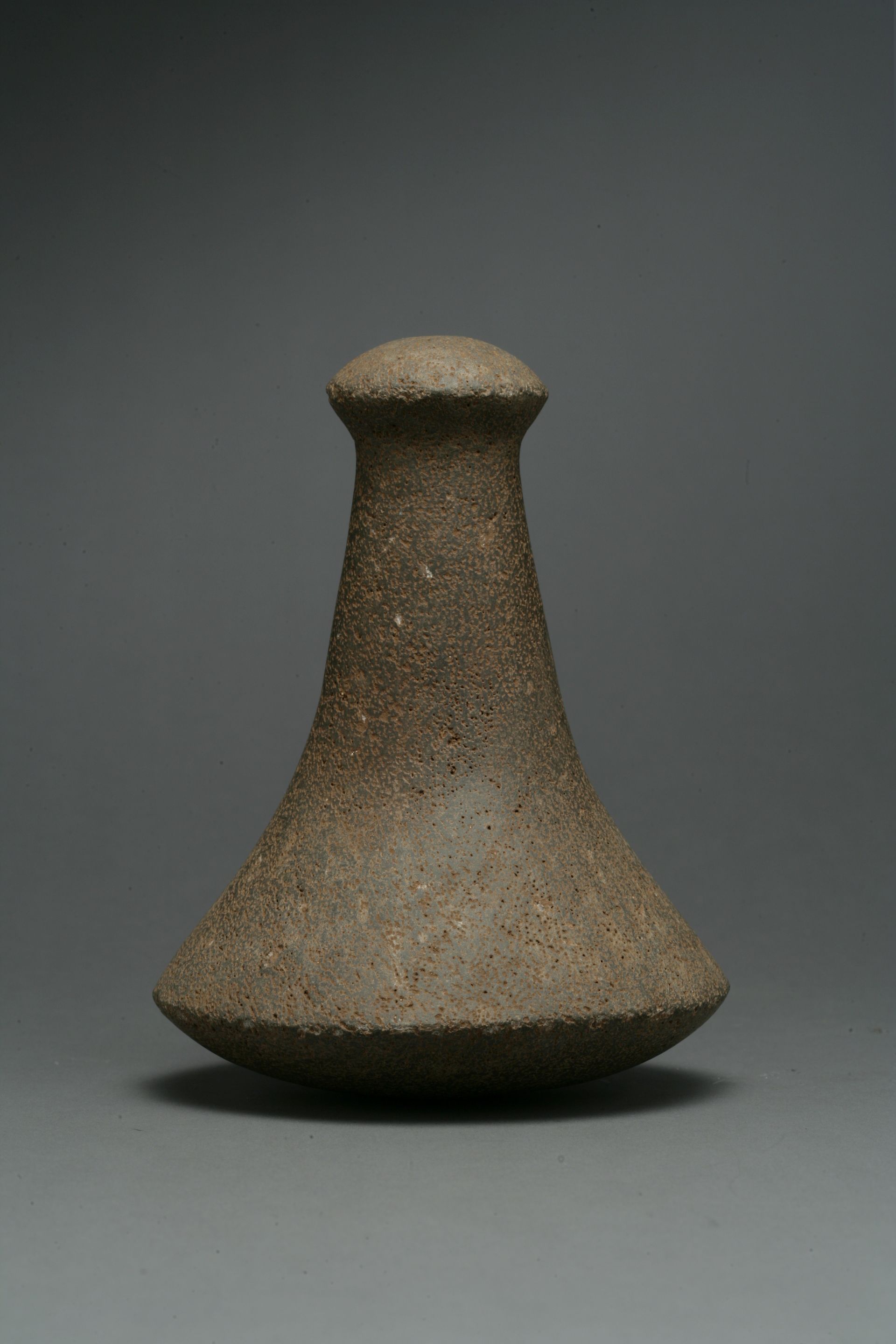 Bonhams : A Hawaiian basalt poi pounder