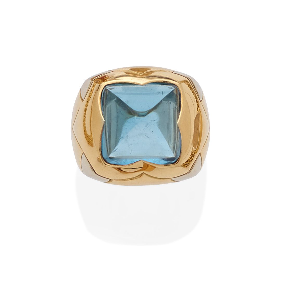 Bonhams A blue topaz and 18k bi-color gold 'pyramid' ring, Bulgari