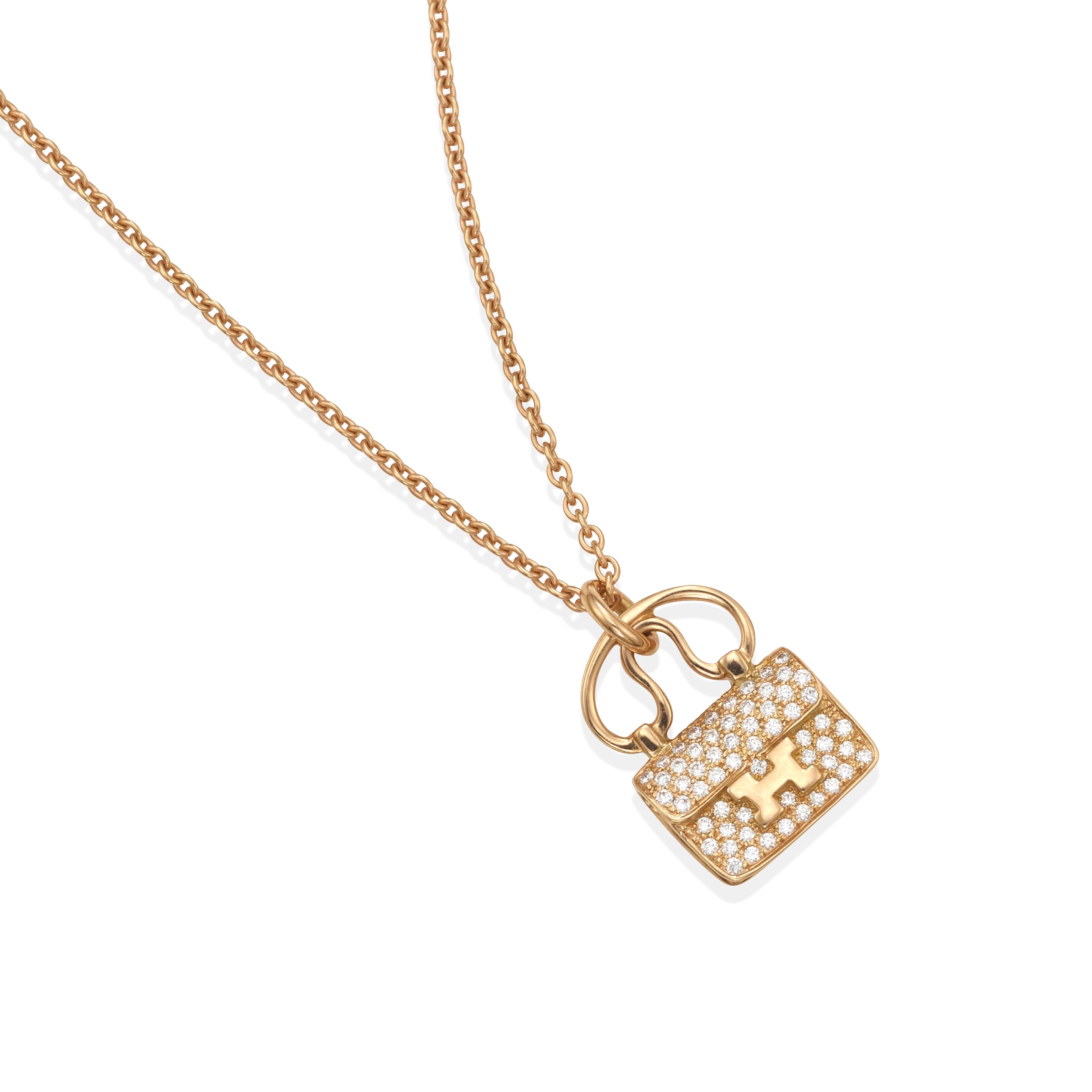Bonhams HERMES: AN 18K ROSE GOLD AND DIAMOND 'AMULETTES