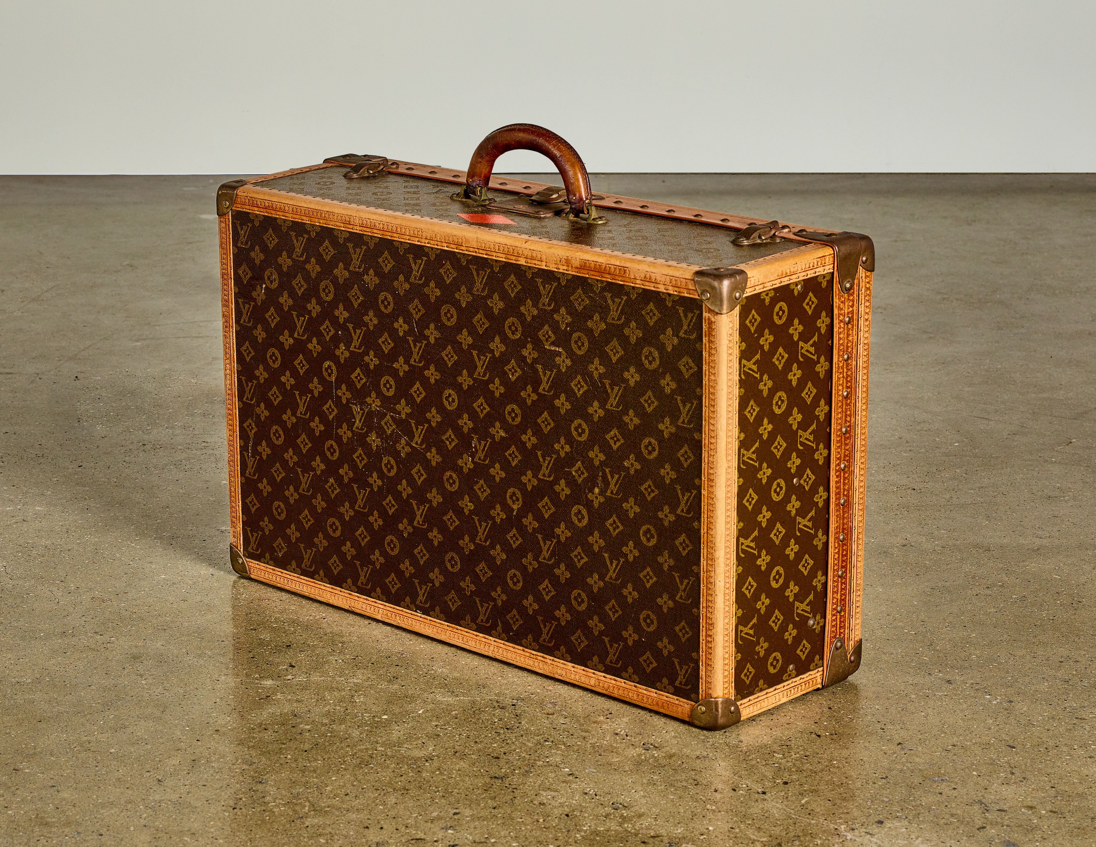 Bonhams : LOUIS VUITTON (ESTABLISHED 1854) Suitcasepatterned 