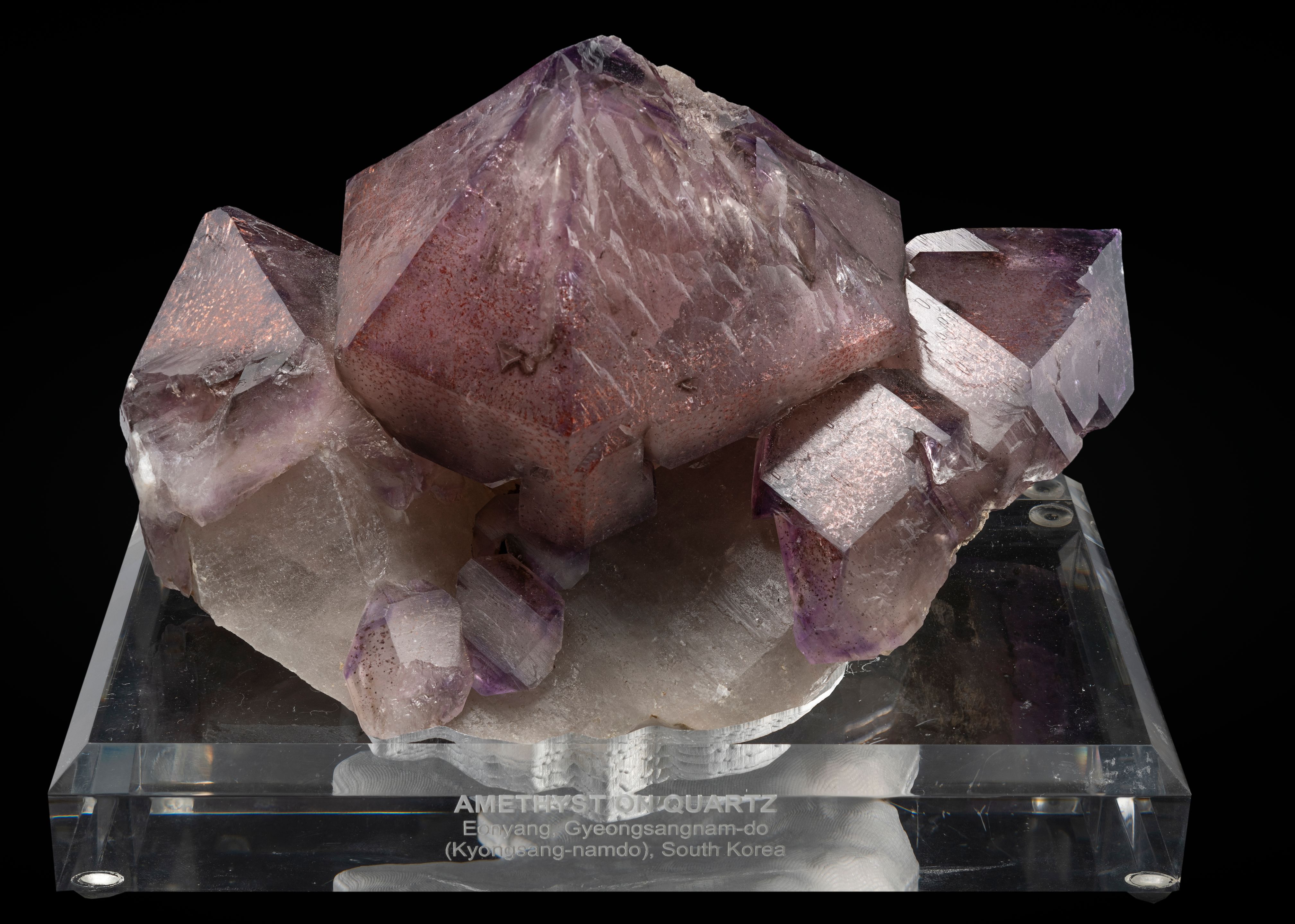 Bonhams : Amethyst with Hematite Inclusions on Acrylic Base